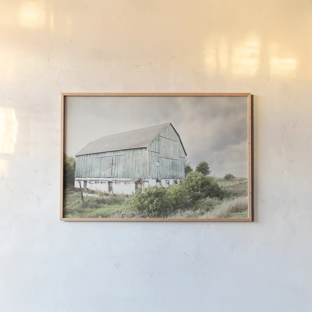 Late Summer Barn I Crop by Elizabeth Urquhart. shown as a paper print in a natural frame. Available as a archival giclee rolled canvas, fine art paper, or poster print. SKU 30333i.