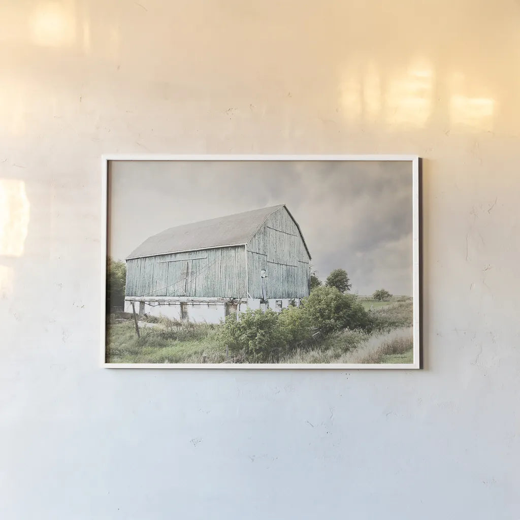 Late Summer Barn I Crop by Elizabeth Urquhart. shown as a paper print in a white frame. Available as a archival giclee rolled canvas, fine art paper, or poster print. SKU 30333i.