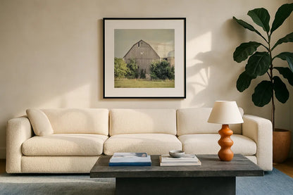 Late Summer Barn II Crop by Elizabeth Urquhart. Displayed in a glass frame with matte in a clean modern living room. Available as an archival giclee rolled canvas, fine art paper, or poster print. SKU 30334a.