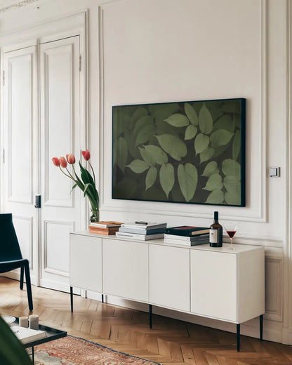 Leafy II by Elizabeth Urquhart. shown as a framed stretched canvas in a living room above a console. Available as a archival giclee rolled canvas, fine art paper, or poster print. SKU 50719i.