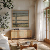 Neutral Country I Crop by Elizabeth Urquhart. Shown in a natural wood frame in a cozy modern living room. Available as an archival giclee rolled canvas, fine art paper, or poster print. SKU 22383a.