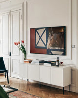 Patriotic Pony I by Elizabeth Urquhart. shown as a framed stretched canvas in a living room above a console. Available as a archival giclee rolled canvas, fine art paper, or poster print. SKU 23780i.