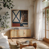 Patriotic Pony I Crop by Elizabeth Urquhart. Shown in a natural wood frame in a cozy modern living room. Available as an archival giclee rolled canvas, fine art paper, or poster print. SKU 23780a.