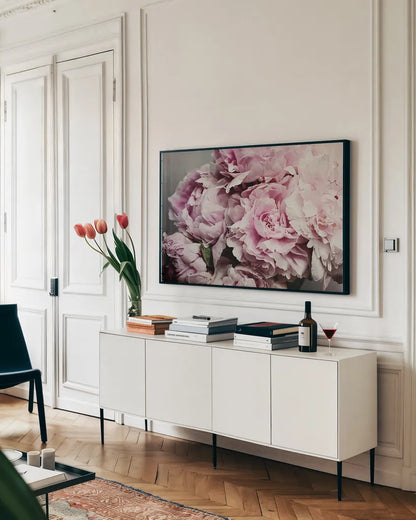 Peonies Galore II by Elizabeth Urquhart. shown as a framed stretched canvas in a living room above a console. Available as a archival giclee rolled canvas, fine art paper, or poster print. SKU 22332i.