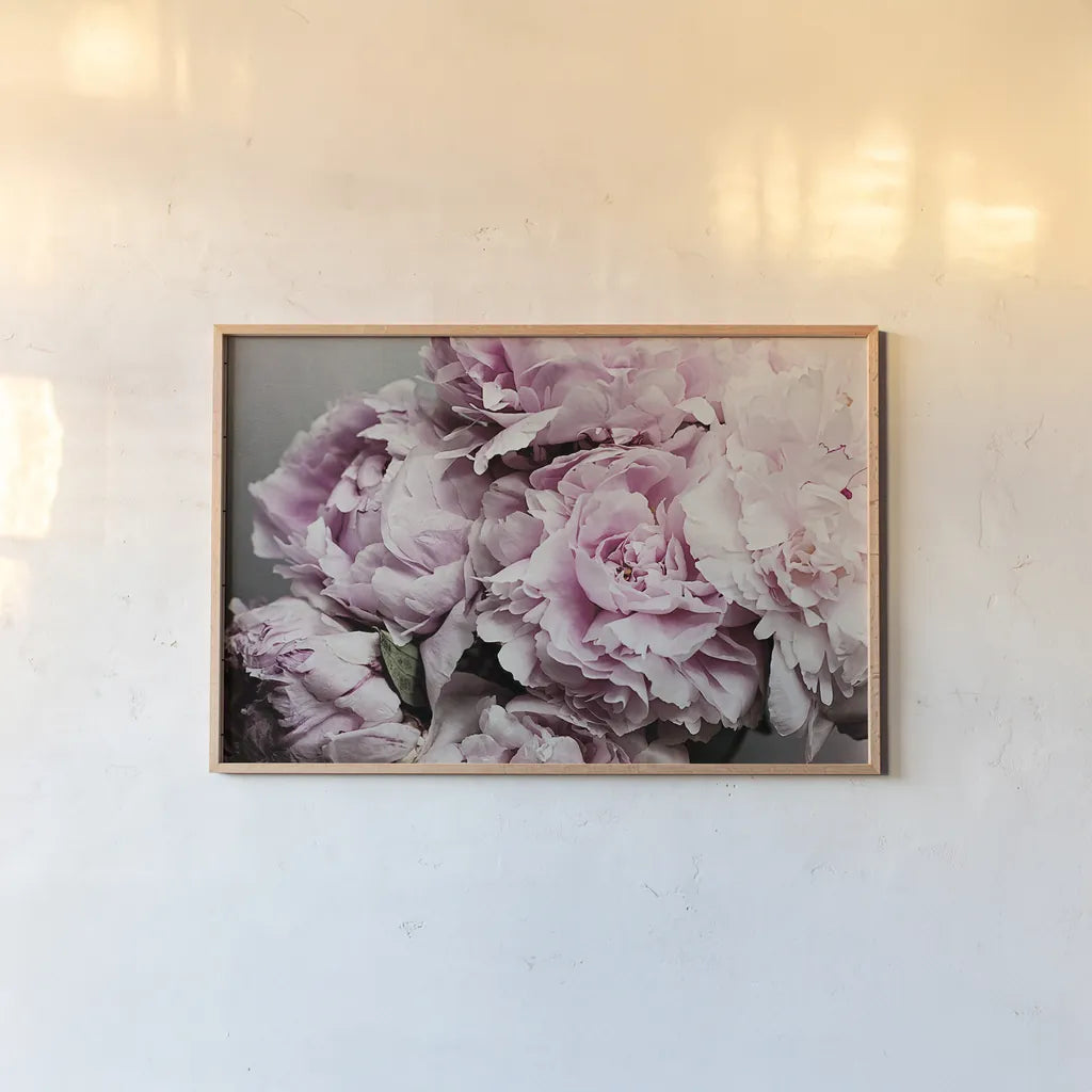 Peonies Galore II by Elizabeth Urquhart. shown as a paper print in a natural frame. Available as a archival giclee rolled canvas, fine art paper, or poster print. SKU 22332i.