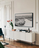 Road Trip VI by Elizabeth Urquhart. shown as a framed stretched canvas in a living room above a console. Available as a archival giclee rolled canvas, fine art paper, or poster print. SKU 50742i.