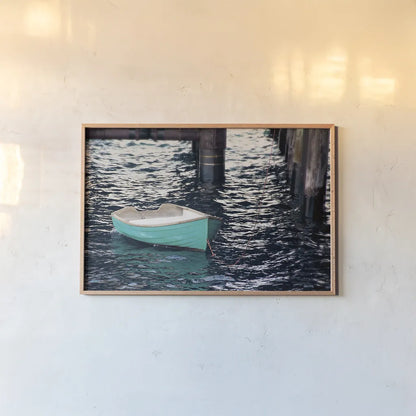 Rowboat II by Elizabeth Urquhart. shown as a paper print in a natural frame. Available as a archival giclee rolled canvas, fine art paper, or poster print. SKU 22326i.