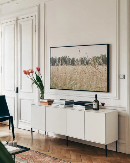 Summer Field II by Elizabeth Urquhart. shown as a framed stretched canvas in a living room above a console. Available as a archival giclee rolled canvas, fine art paper, or poster print. SKU 74452i.