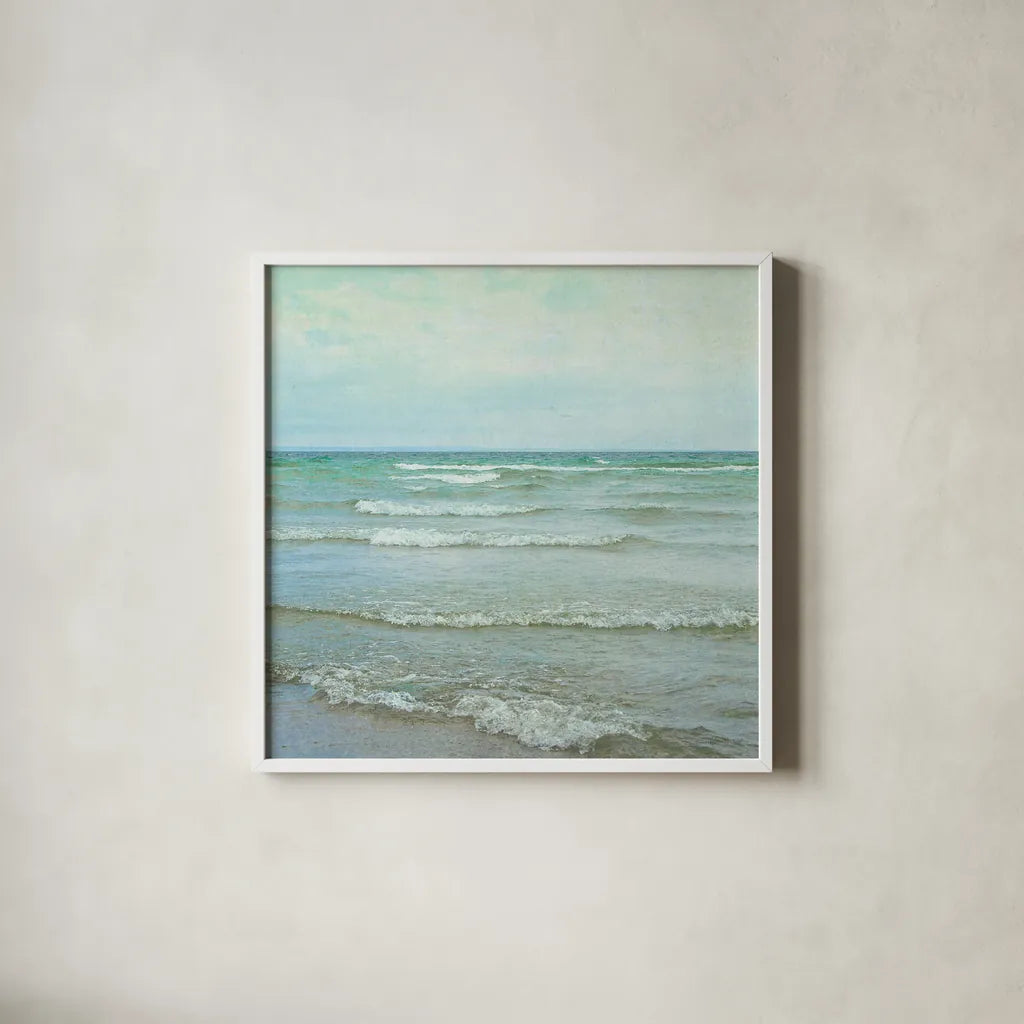 The Tide I Square by Elizabeth Urquhart. Shown in a crisp white glass frame for a clean and minimalist style. Available as an archival giclee rolled canvas, fine art paper, or poster print. SKU 17682a.