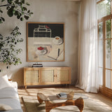 Correspondence Square by Emily Adams. Shown in a natural wood frame in a cozy modern living room. Available as an archival giclee rolled canvas, fine art paper, or poster print. SKU 34645a.