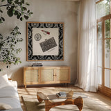 Cosmetique II by Emily Adams. Shown in a natural wood frame in a cozy modern living room. Available as an archival giclee rolled canvas, fine art paper, or poster print. SKU 11263a.