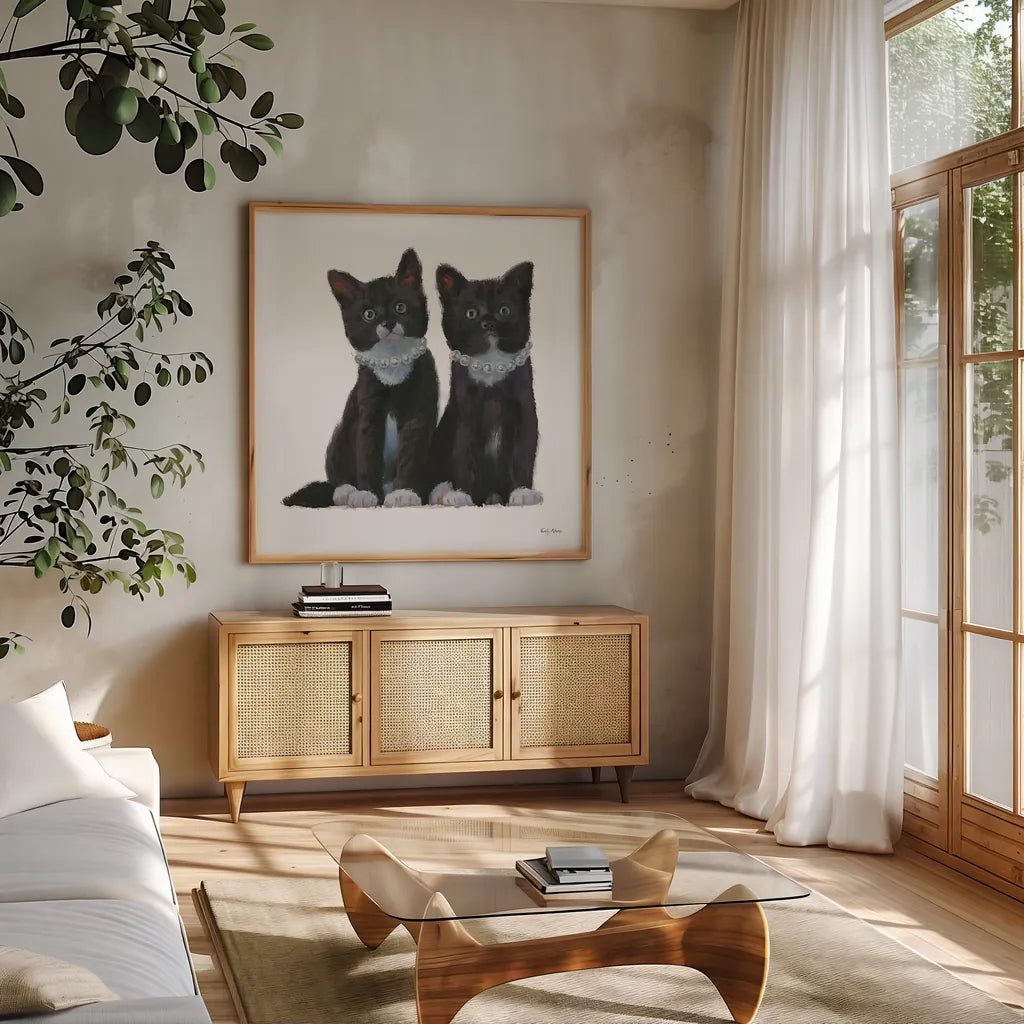 Cutie Kitties IV by Emily Adams. Shown in a natural wood frame in a cozy modern living room. Available as an archival giclee rolled canvas, fine art paper, or poster print. SKU 44466a.