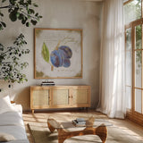 Garden Treasures VI by Emily Adams. Shown in a natural wood frame in a cozy modern living room. Available as an archival giclee rolled canvas, fine art paper, or poster print. SKU 25989a.