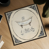Le Petit Spa I Square by Emily Adams. Shown as a detailed flat fine art print, highlighting archival giclee quality. Available as an archival giclee rolled canvas, fine art paper, or poster print. SKU 12593a.