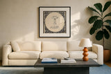Le Petit Spa II Square by Emily Adams. Displayed in a glass frame with matte in a clean modern living room. Available as an archival giclee rolled canvas, fine art paper, or poster print. SKU 12594a.