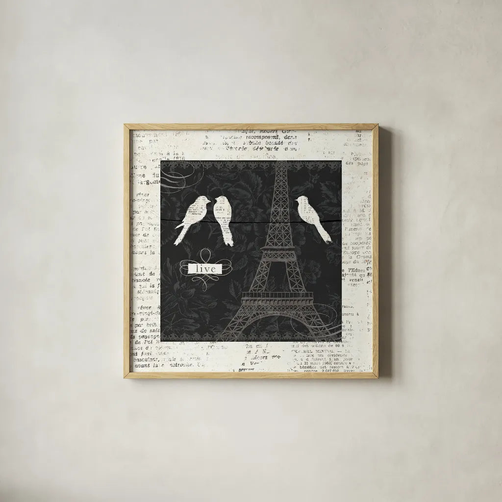 Love Paris I with Border by Emily Adams. Shown in a natural wood glass frame for a timeless modern aesthetic. Available as an archival giclee rolled canvas, fine art paper, or poster print. SKU 13191a.