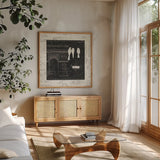 Love Paris II with Border by Emily Adams. Shown in a natural wood frame in a cozy modern living room. Available as an archival giclee rolled canvas, fine art paper, or poster print. SKU 13192a.