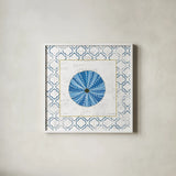 Navy Circular Shell on Newsprint with Gold by Emily Adams. Shown in a crisp white glass frame for a clean and minimalist style. Available as an archival giclee rolled canvas, fine art paper, or poster print. SKU 23562a.