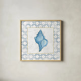 Navy Conch Shell on Newsprint with Gold by Emily Adams. Shown in a natural wood glass frame for a timeless modern aesthetic. Available as an archival giclee rolled canvas, fine art paper, or poster print. SKU 23558a.