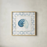 Navy Nautilus Shell on Newsprint with Gold by Emily Adams. Shown in a natural wood glass frame for a timeless modern aesthetic. Available as an archival giclee rolled canvas, fine art paper, or poster print. SKU 23559a.
