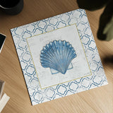 Navy Scallop Shell on Newsprint with Gold by Emily Adams. Shown as a detailed flat fine art print, highlighting archival giclee quality. Available as an archival giclee rolled canvas, fine art paper, or poster print. SKU 23560a.