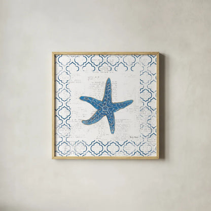 Navy Starfish on Newsprint by Emily Adams. Shown in a natural wood glass frame for a timeless modern aesthetic. Available as an archival giclee rolled canvas, fine art paper, or poster print. SKU 23473a.