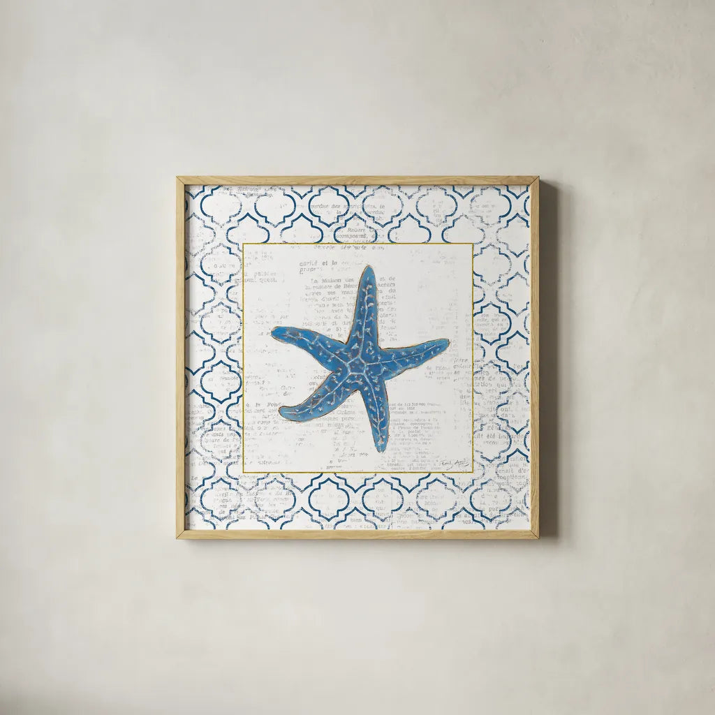 Navy Starfish on Newsprint with Gold by Emily Adams. Shown in a natural wood glass frame for a timeless modern aesthetic. Available as an archival giclee rolled canvas, fine art paper, or poster print. SKU 23561a.