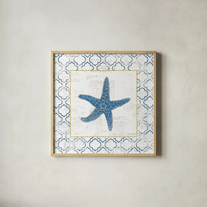 Navy Starfish on Newsprint with Gold by Emily Adams. Shown in a natural wood glass frame for a timeless modern aesthetic. Available as an archival giclee rolled canvas, fine art paper, or poster print. SKU 23561a.