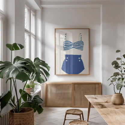 Retro Swimwear II by Emily Adams. shown as a print in a natural wood frame in a dining room. Available as a archival giclee rolled canvas, fine art paper, or poster print. SKU 69132h.