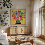 A Bunch of Flowers III by Farida Zaman. Shown in a natural wood frame in a cozy modern living room. Available as an archival giclee rolled canvas, fine art paper, or poster print. SKU 70055a.