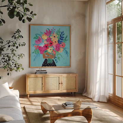 A Bunch of Flowers IV by Farida Zaman. Shown in a natural wood frame in a cozy modern living room. Available as an archival giclee rolled canvas, fine art paper, or poster print. SKU 70056a.