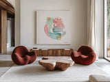 Abstract Monogram E by Farida Zaman. Shown as extra-large giant wall art in a modern living room. Available as an archival giclee rolled canvas, fine art paper, or poster print. SKU 48435a.
