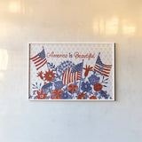 America the Beautiful I by Farida Zaman. shown as a paper print in a white frame. Available as a archival giclee rolled canvas, fine art paper, or poster print. SKU 47535i.