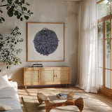 Black and White Botanical I Navy by Farida Zaman. Shown in a natural wood frame in a cozy modern living room. Available as an archival giclee rolled canvas, fine art paper, or poster print. SKU 65149a.