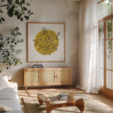 Black and White Botanical IV by Farida Zaman. Shown in a natural wood frame in a cozy modern living room. Available as an archival giclee rolled canvas, fine art paper, or poster print. SKU 61604a.