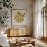 Black and White Botanical IV Sunshine by Farida Zaman. Shown in a natural wood frame in a cozy modern living room. Available as an archival giclee rolled canvas, fine art paper, or poster print. SKU 65152a.