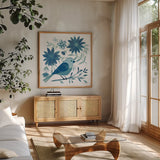 Blue Bird I by Farida Zaman. Shown in a natural wood frame in a cozy modern living room. Available as an archival giclee rolled canvas, fine art paper, or poster print. SKU 79039a.