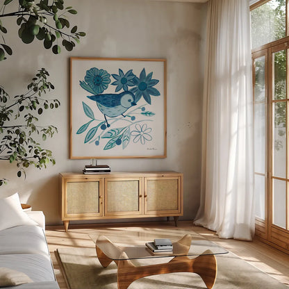 Blue Bird III by Farida Zaman. Shown in a natural wood frame in a cozy modern living room. Available as an archival giclee rolled canvas, fine art paper, or poster print. SKU 79040a.