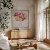 Bouquet for You Bright by Farida Zaman. Shown in a natural wood frame in a cozy modern living room. Available as an archival giclee rolled canvas, fine art paper, or poster print. SKU 46149a.