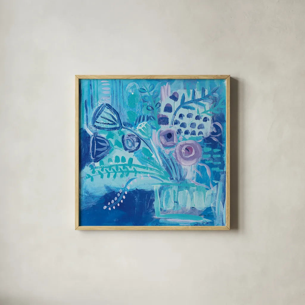 Burst of Blue by Farida Zaman. Shown in a natural wood glass frame for a timeless modern aesthetic. Available as an archival giclee rolled canvas, fine art paper, or poster print. SKU 44835a.