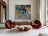 Burst of Magic by Farida Zaman. Shown as extra-large giant wall art in a modern living room. Available as an archival giclee rolled canvas, fine art paper, or poster print. SKU 32157a.
