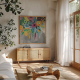 Burst of Magic Autumn by Farida Zaman. Shown in a natural wood frame in a cozy modern living room. Available as an archival giclee rolled canvas, fine art paper, or poster print. SKU 36200a.