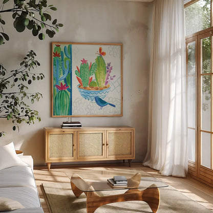 Cacti Garden II by Farida Zaman. Shown in a natural wood frame in a cozy modern living room. Available as an archival giclee rolled canvas, fine art paper, or poster print. SKU 33101a.