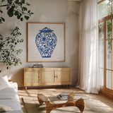 Chinoiserie III by Farida Zaman. Shown in a natural wood frame in a cozy modern living room. Available as an archival giclee rolled canvas, fine art paper, or poster print. SKU 44127a.