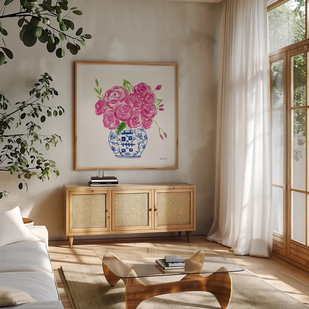 Chinoiserie Roses on White II by Farida Zaman. Shown in a natural wood frame in a cozy modern living room. Available as an archival giclee rolled canvas, fine art paper, or poster print. SKU 55703a.