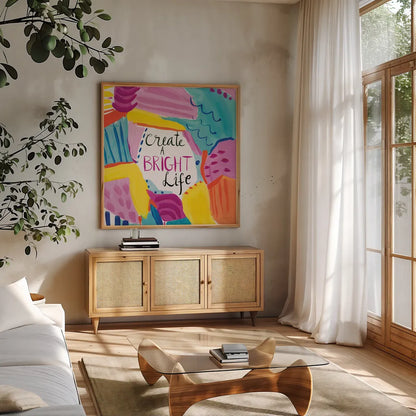 Create a Bright Life by Farida Zaman. Shown in a natural wood frame in a cozy modern living room. Available as an archival giclee rolled canvas, fine art paper, or poster print. SKU 58411a.