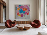 Delicate Flair I by Farida Zaman. Shown as extra-large giant wall art in a modern living room. Available as an archival giclee rolled canvas, fine art paper, or poster print. SKU 38699a.