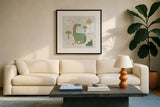 Dino Fun I by Farida Zaman. Displayed in a glass frame with matte in a clean modern living room. Available as an archival giclee rolled canvas, fine art paper, or poster print. SKU 90107a.