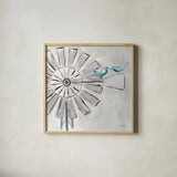 Farmhouse Windmill with Birds by Farida Zaman. Shown in a natural wood glass frame for a timeless modern aesthetic. Available as an archival giclee rolled canvas, fine art paper, or poster print. SKU 73869a.