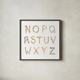 Floral Alphabet Sq II by Farida Zaman. Shown in a sleek black glass frame for a contemporary gallery look. Available as an archival giclee rolled canvas, fine art paper, or poster print. SKU 65968a.